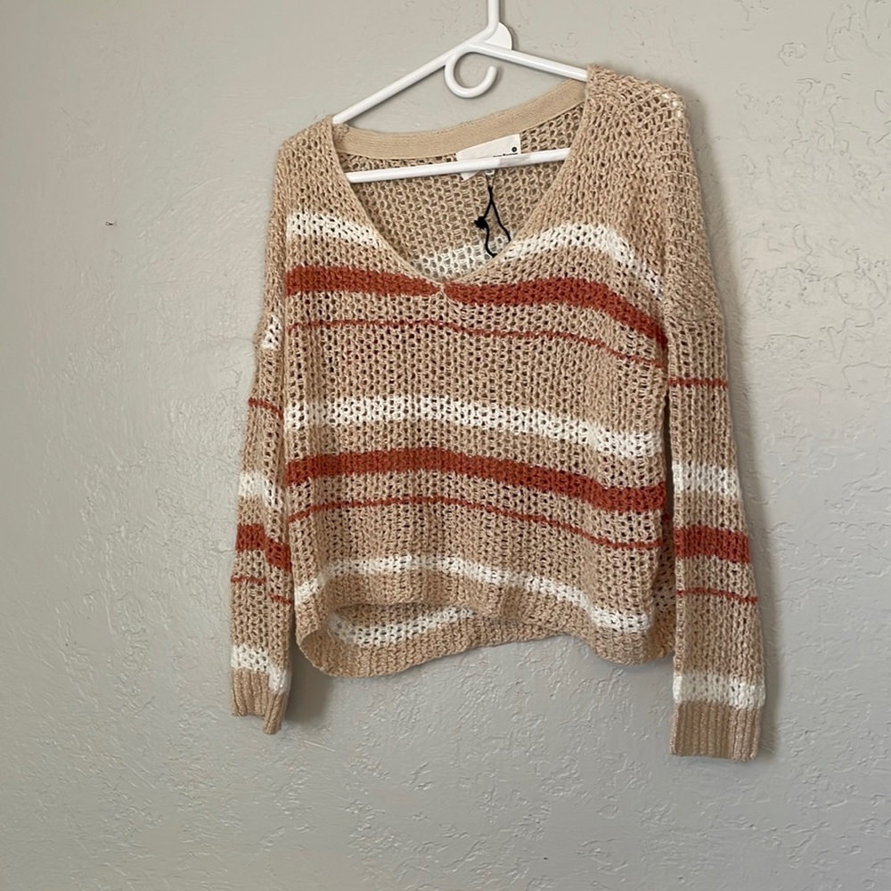 Peach and white sweater